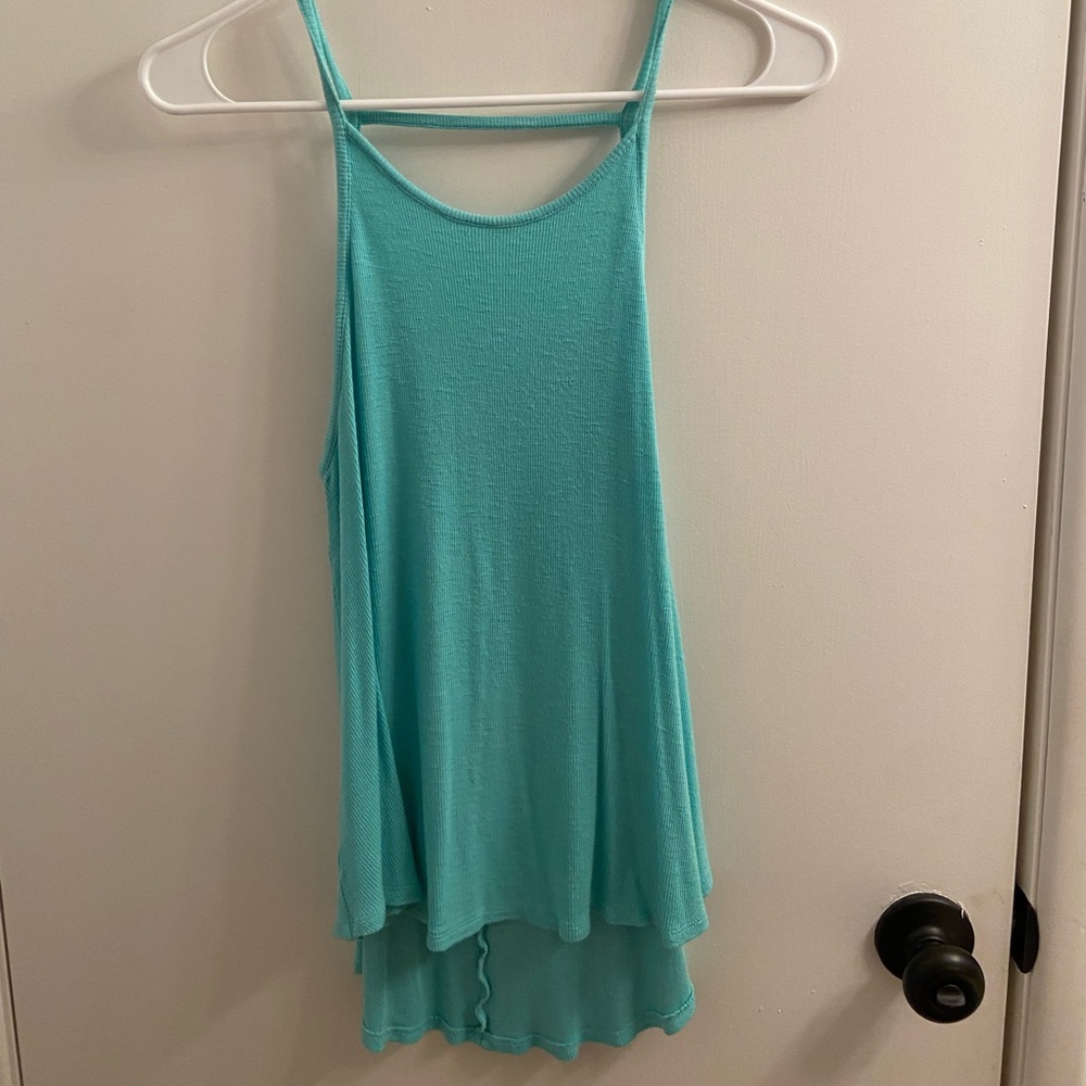 Teal tank top with open back.